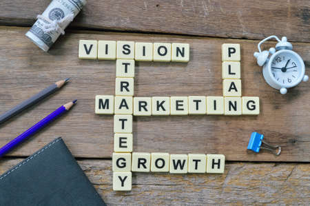 Square letters with text VISION, STRATEGY, PLAN, MARKETING and GROWTH.の写真素材