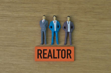 People miniatures and wooden block written with REALTOR.の写真素材