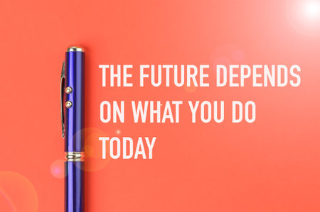 A motivational quote written with THE FUTURE DEPENDS ON WHAT YOU DO TODAY.の写真素材