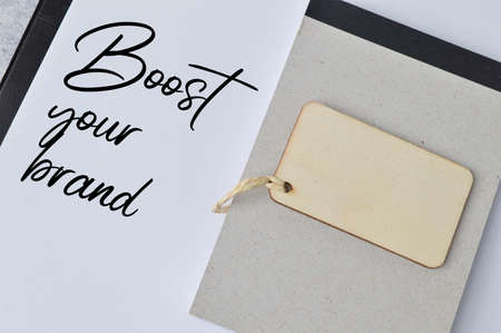 White paper written with text BOOST YOUR BRAND.の写真素材