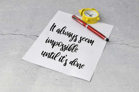 Motivational quote written with IT ALWAYS SEEM IMPOSSIBLE UNTIL IT'S DONE.