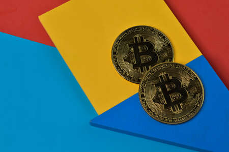 Golden bitcoins on wooden blocks. Business concept.の写真素材