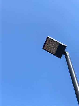 Street lamp over blue background. Sunny dayの写真素材