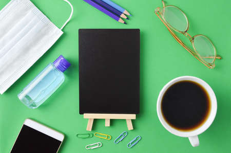 Stationery tools and blackboard with copy space.の写真素材