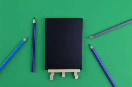 Pencil colors and blackboard with copy space.の写真素材