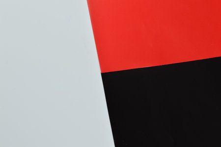 Top view of red, black and white background.の写真素材