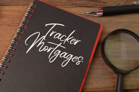 Notebook written with text TRACKER MORTGAGES