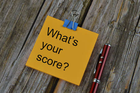 Memo note written with text WHAT'S YOUR SCORE?の写真素材