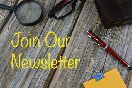 Wooden background written with JOIN OUR NEWSLETTER.の写真素材