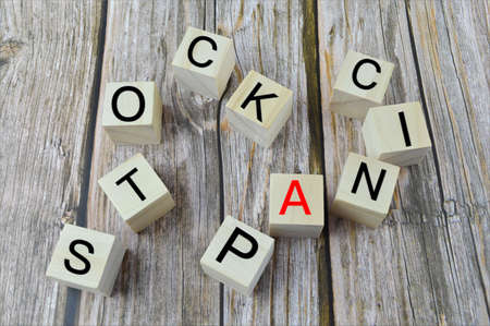 Bunch of wooden cubes with text STOCK PANIC