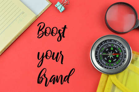 red background written with BOOST YOUR BRAND.の写真素材