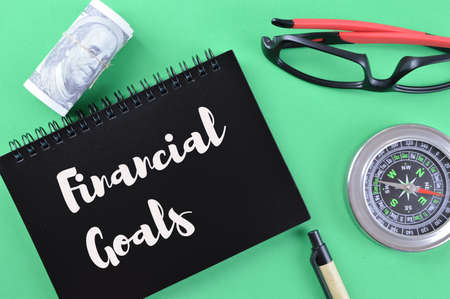 Notebook written with text FINANCIAL GOALSの写真素材