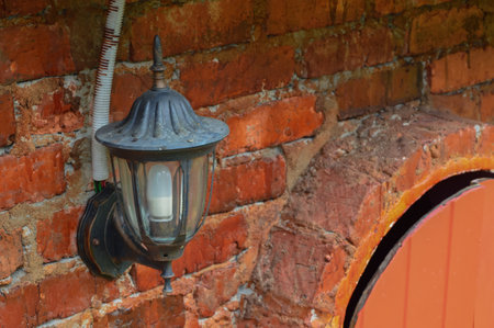 Classic lamp on the wall outside the house. Selective focusの写真素材