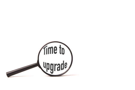 Magnifying glass written with FAQ stands for Frequently Asked Questionsの写真素材