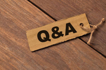 Memo note written with text Q&A stands for question and answer.の写真素材