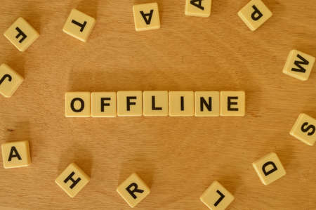 Top view of square letters with text OFFLINE.の写真素材