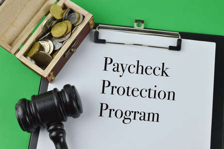 White paper written with text PAYCHECK PROTECTION PROGRAMの写真素材