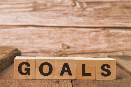 Wooden cubes with text GOALS. Motivational concept.の写真素材