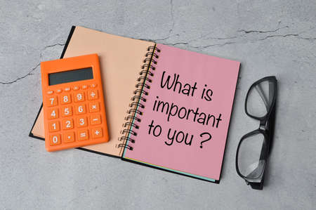 Notebook written with WHAT IS IMPORTANT TO YOU?の写真素材