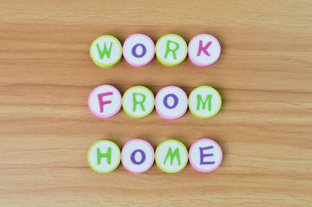 Alphabet letters with text WORK FROM HOME. Conceptual imageの写真素材
