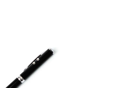 Top view of black pen over white background with copy spaceの写真素材