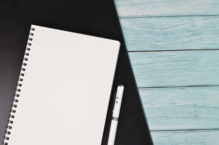 Top view of pen and notebook with copy space. Conceptual image