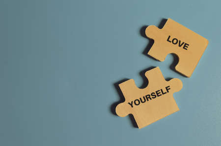 Top view of jigsaw puzzle with text LOVE YOURSELFの写真素材