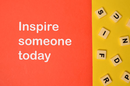 Top view of alphabet letters with text INSPIRE SOMEONE TODAY.の写真素材