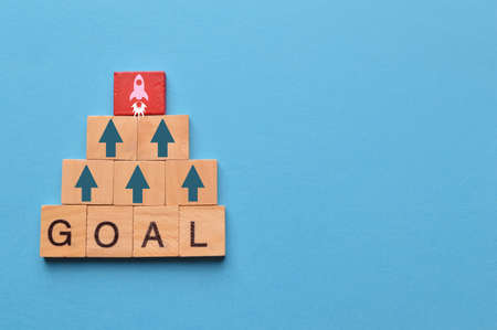 Rocket and arrow up symbols with the word GOAL.の写真素材