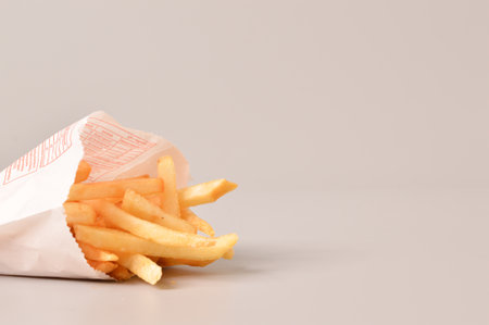 Klang, Malaysia: June 24, 2021- McDonald's french fries in paper cup. McDonald's is a fast food restaurant chinのeditorial素材