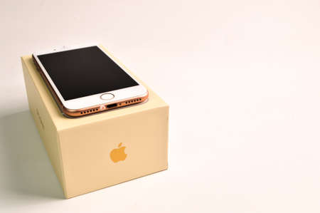 Klang, Malaysia: July 20, 2021, Iphone 8 gold color and box isolated on white backgroundのeditorial素材