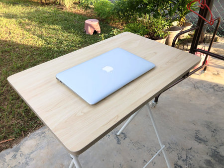 Klang, Malaysia: July 21st, 2021- Macbook Air on the table. Selective focusのeditorial素材