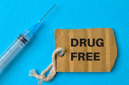 Syringe injection and label tag with text DRUG FREEの写真素材