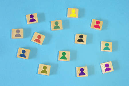 Different color of human symbol on wooden blocks. Different skills and different abilities concept.