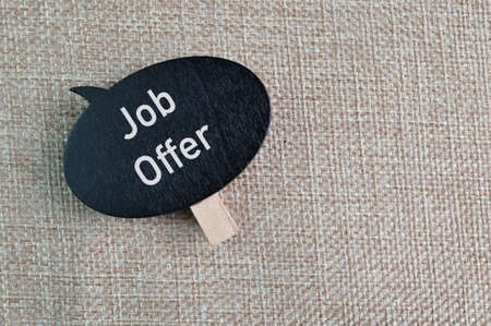 Bubble wooden tag written with text JOB OFFERの写真素材