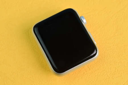 Klang, Malaysia: September 6, 2021- Apple watch screen isolated on a yellow backgroundのeditorial素材