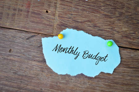 Torn paper written with text MONTHLY BUDGETの写真素材