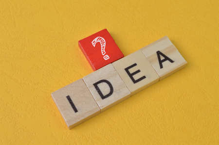 Square letters with text IDEA and question mark symbol