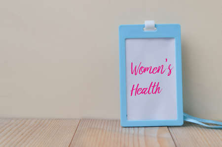 Blue name tag written with text WOMEN'S HEALTHの写真素材