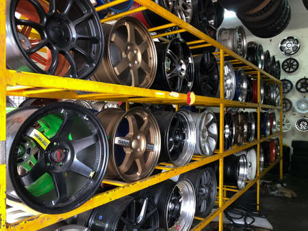 Perak,Malaysia: November 3rd, 2021- Sporty alloy car rim on shelves. Selective focus