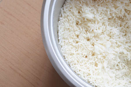 Close up view of cooked rice in electric rice cookerの写真素材