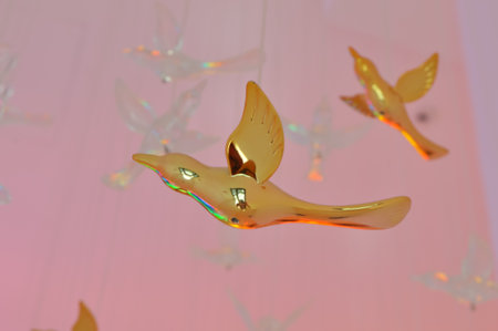 Hanging birds from the roof. Selective focus