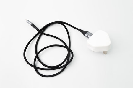 Smartphone usb charger with power plug isolated on a white background