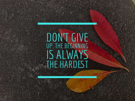 Motivational and inspirational quote with phrase DON'T GIVE UP. THE BEGINNING IS ALWAYS THE HARDESTの写真素材