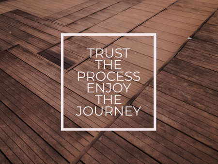 Motivational and inspirational quote with phrase TRUST THE PROCESS ENJOY THE JOURNEYの写真素材