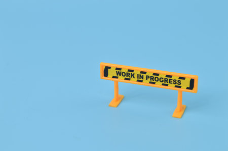 Work in progress sign isolated on a blue background