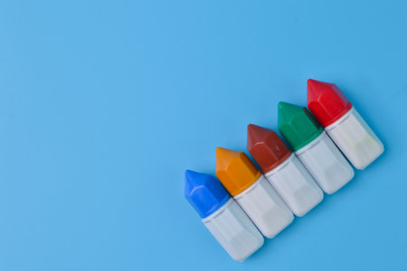 Watercolor isolated on a blue background. Copy space for the textの写真素材