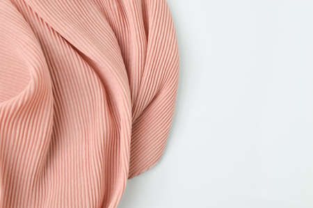 Fabric cloth textured pleated background. Copy space for the text.