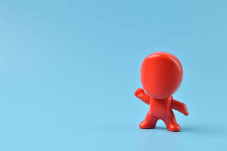 People toy figure standing with powerful expressionの写真素材