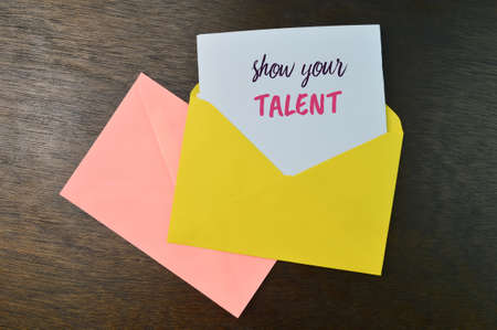 Envelopes and white paper written with SHOW YOUR TALENT